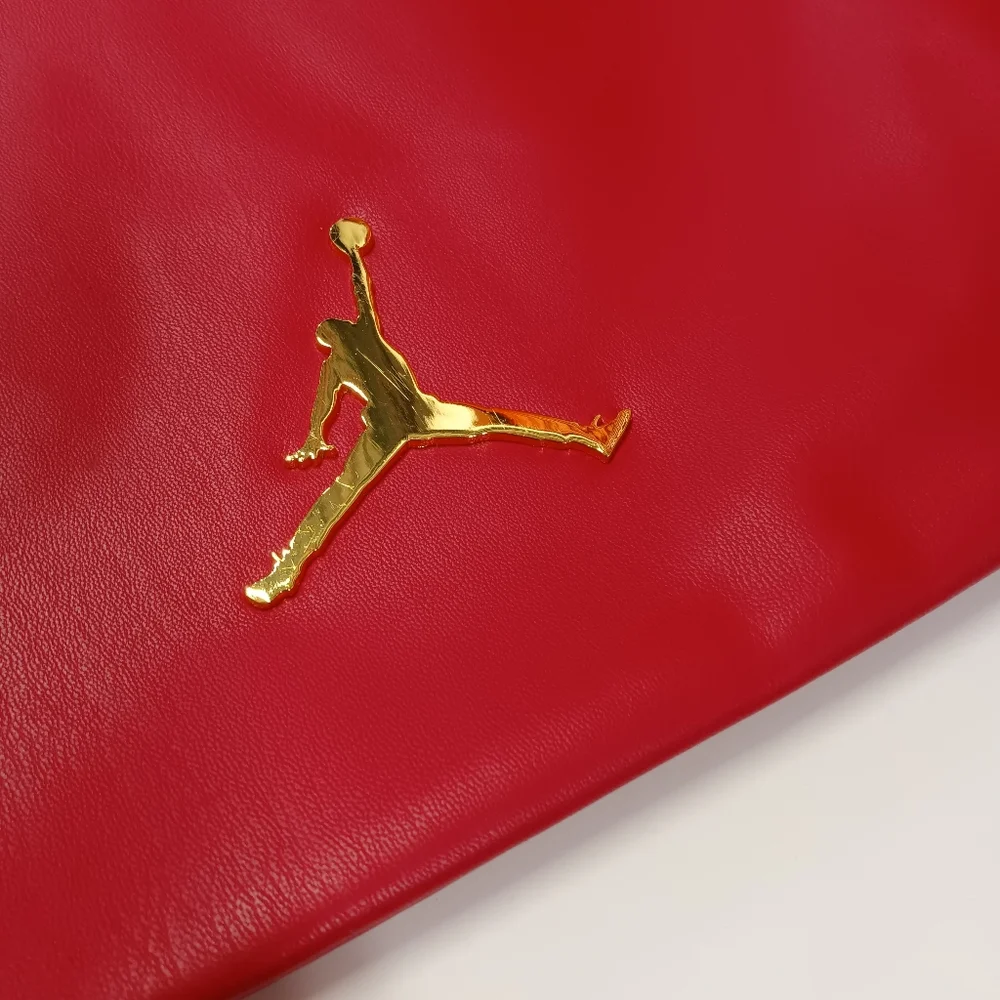 JORDAN Red Faux Leather Drawstring Backpack with Gold Jumpman